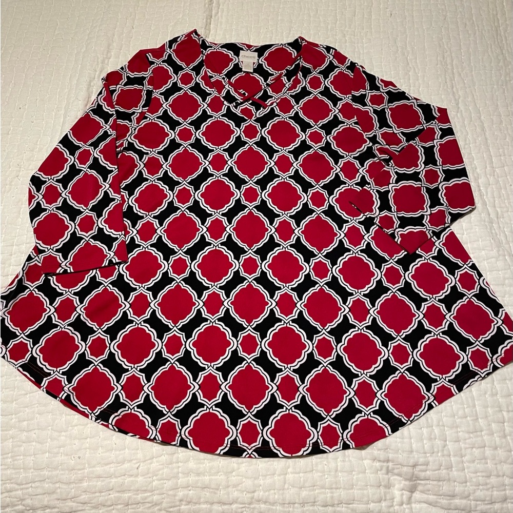 Chico’s A-line top with criss cross neck.